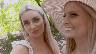 Candee Licious and Emily Bellex masturbating surrounding a toy outdoors